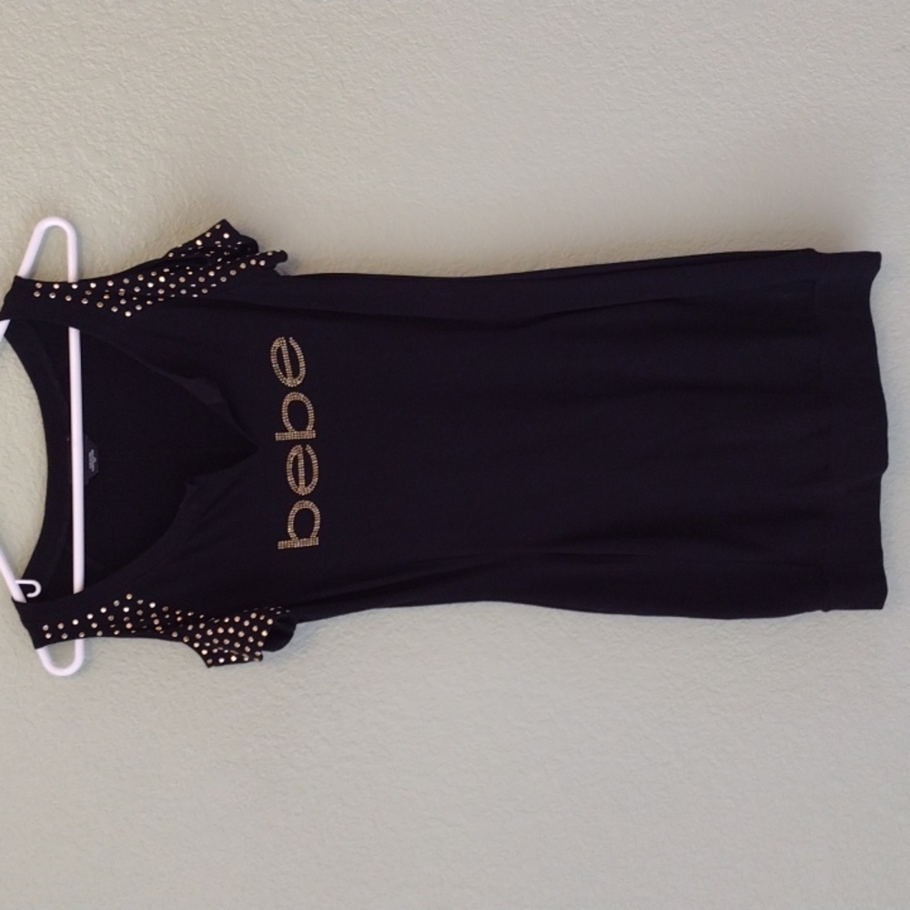 BEBE Off The Shoulder Cut Out Studded Dress.